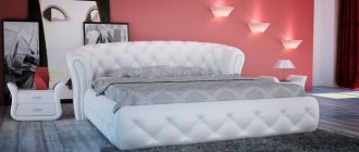 White bed with semicircular headboard