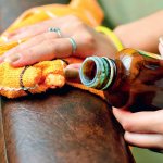 cleaning a leather sofa from brilliant green