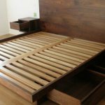 Bed with wooden slats
