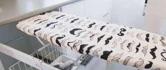 built-in ironing board in the kitchen